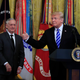 President Donald Trump with Defense Secretary Jim Mattis gestures during a reception commemorating the 35th anniversary of the attack on Beirut Barracks in the East Room at the White House in Washington, Thursday, Oct. 25, 2018.